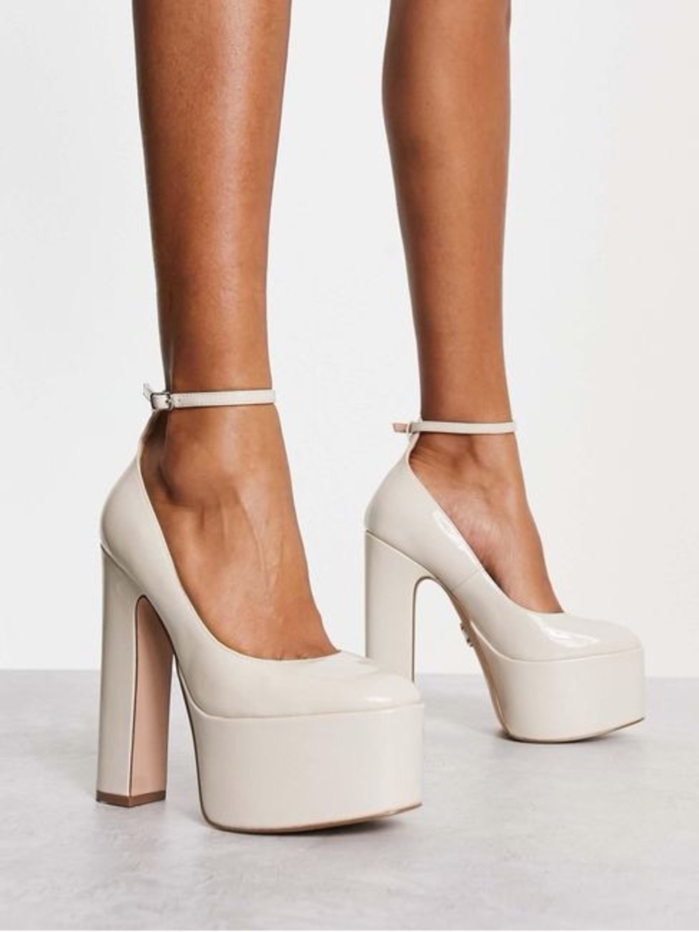 Steve Madden Skyrise Platform Ankle-Strap Pumps in Cream
